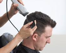 image of a person getting his hair cut