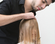 image of a person getting his hair cut